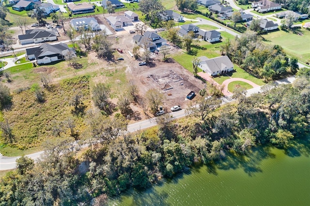 aerial view featuring a water view and a residential view