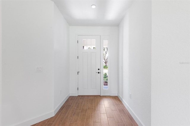 2569 Rogers Rd, Lakeland, FL 33812 - entryway featuring wood finished floors and baseboards