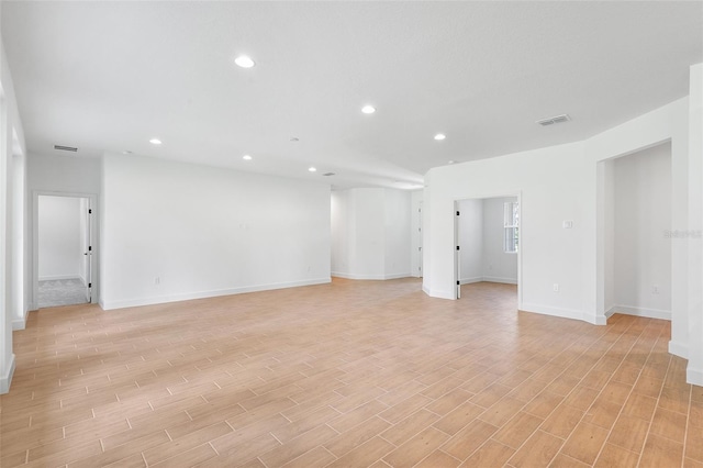 2569 Rogers Rd, Lakeland, FL 33812 - unfurnished room with light wood-type flooring and recessed lighting