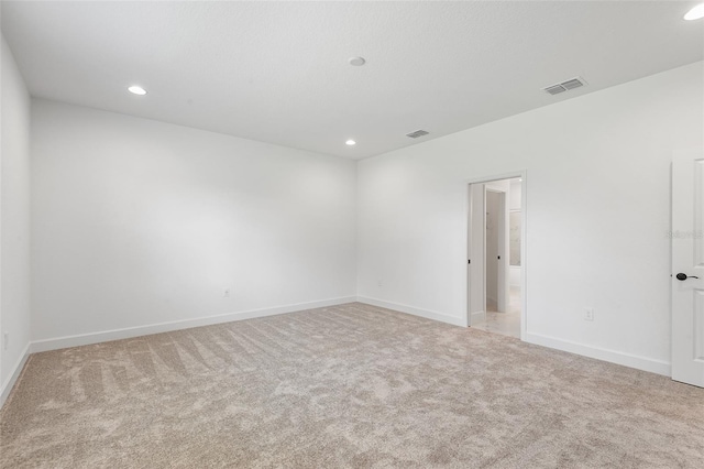 2569 Rogers Rd, Lakeland, FL 33812 - unfurnished room featuring light carpet and recessed lighting