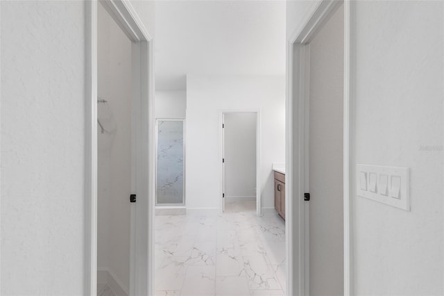 2569 Rogers Rd, Lakeland, FL 33812 - hall with light marble finish floors and baseboards