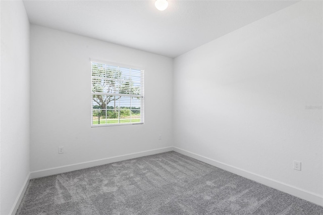 2569 Rogers Rd, Lakeland, FL 33812 - spare room with carpet and baseboards