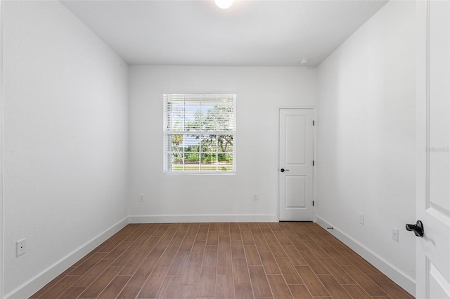 2569 Rogers Rd, Lakeland, FL 33812 - spare room featuring wood finished floors and baseboards