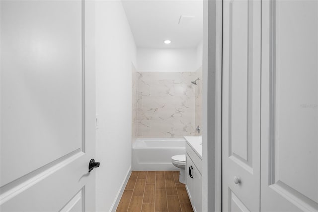 2569 Rogers Rd, Lakeland, FL 33812 - full bath featuring vanity, wood finished floors, shower / bathtub combination, and recessed lighting