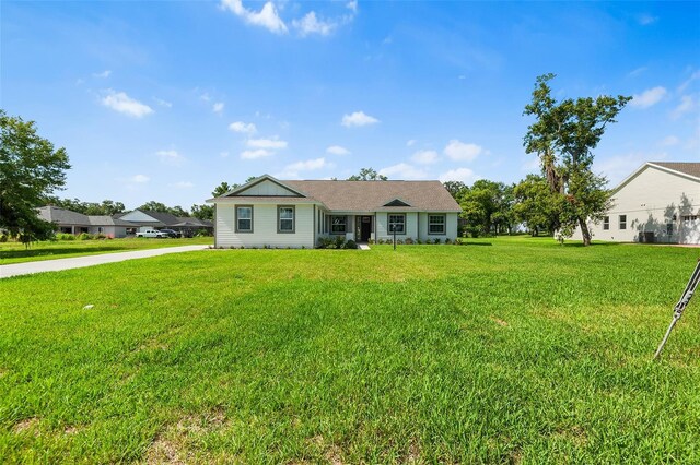 2569 Rogers Rd, Lakeland, FL 33812 - ranch-style house with a front yard