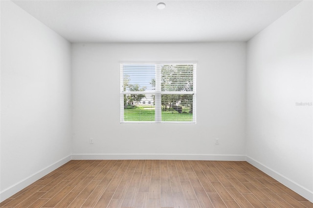 2569 Rogers Rd, Lakeland, FL 33812 - spare room with wood finished floors