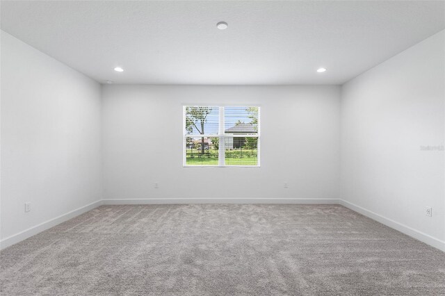 2569 Rogers Rd, Lakeland, FL 33812 - empty room featuring carpet flooring and recessed lighting