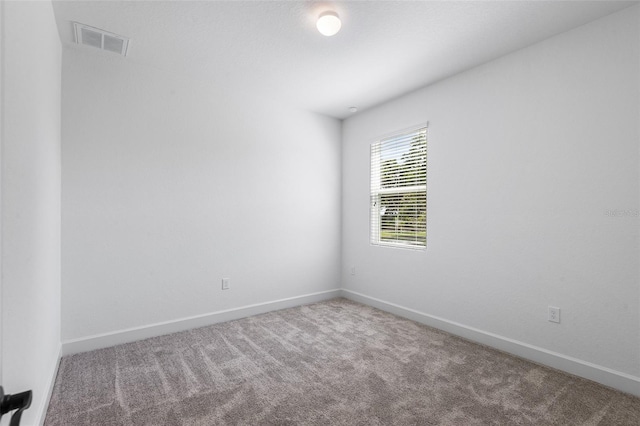 2569 Rogers Rd, Lakeland, FL 33812 - carpeted empty room with baseboards
