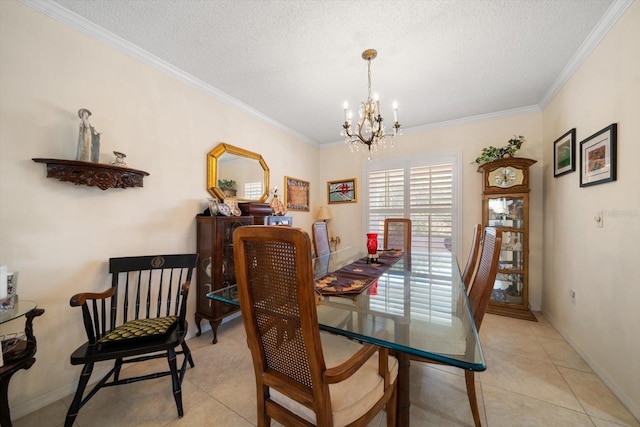 dining room with a chandelier, light tile patterned floors, a textured ceiling, baseboards, and crown molding