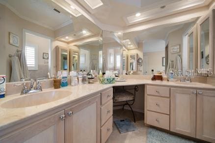 bathroom featuring recessed lighting, crown molding, and vanity