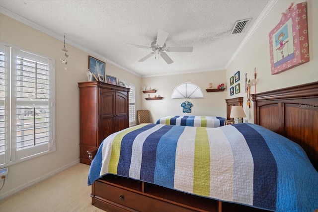 bedroom with visible vents, crown molding, light carpet, and a textured ceiling