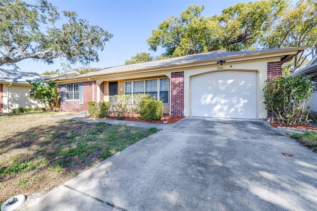 single story home with a garage