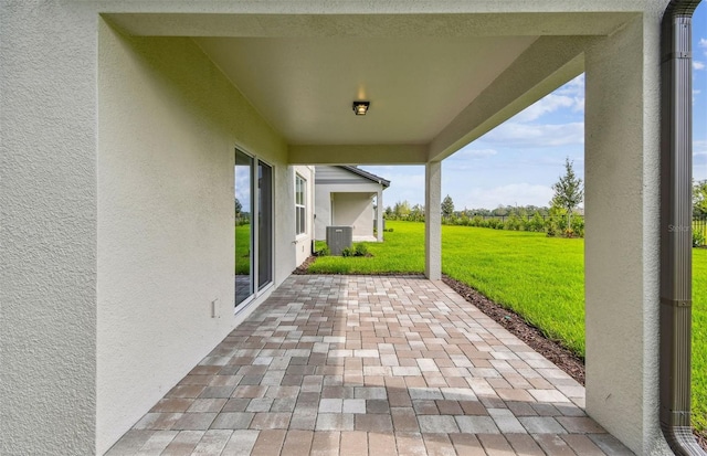 10352 Cross River Trl, Parrish, FL 34219 - view of patio with central AC unit