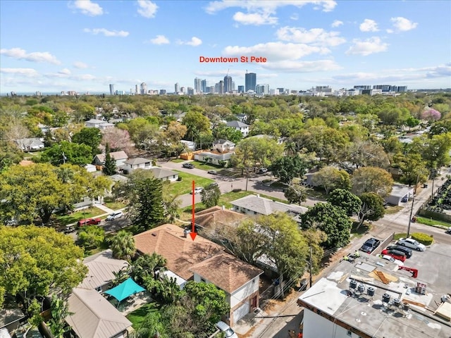 drone / aerial view featuring a city view