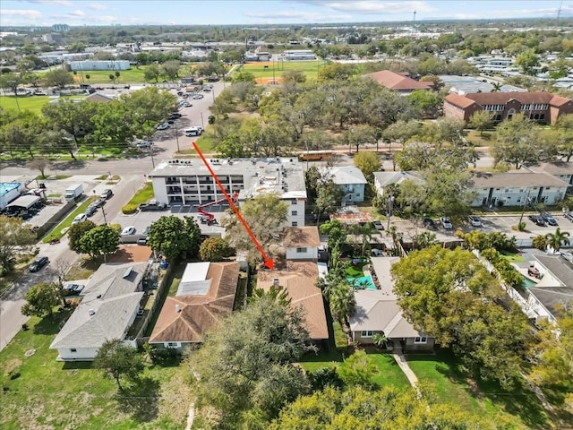 birds eye view of property with a residential view