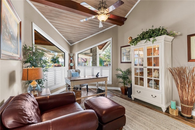 living area featuring wood finished floors, baseboards, wood ceiling, ceiling fan, and vaulted ceiling