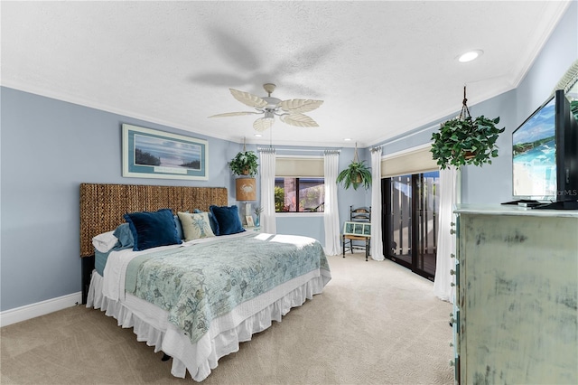 bedroom with baseboards, a textured ceiling, crown molding, access to outside, and light colored carpet