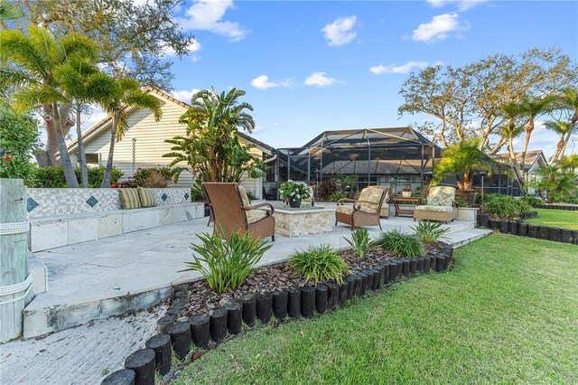 view of yard featuring a lanai and a patio