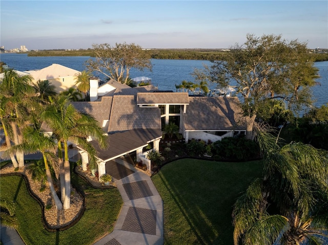 birds eye view of property featuring a water view