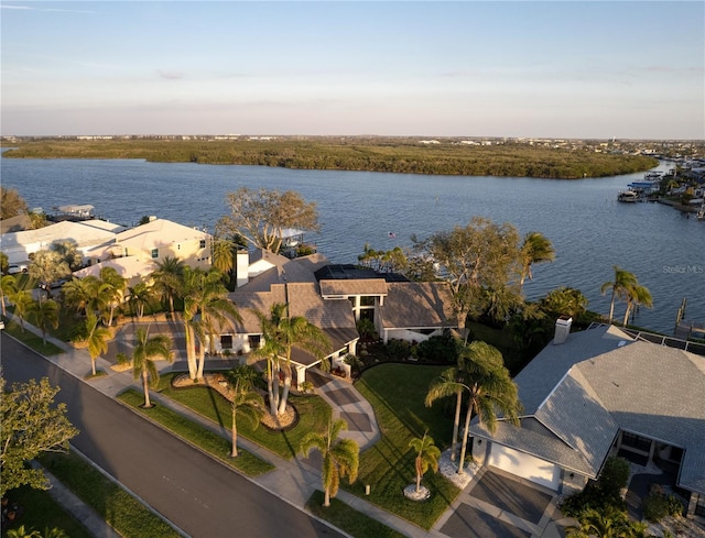 bird's eye view with a water view