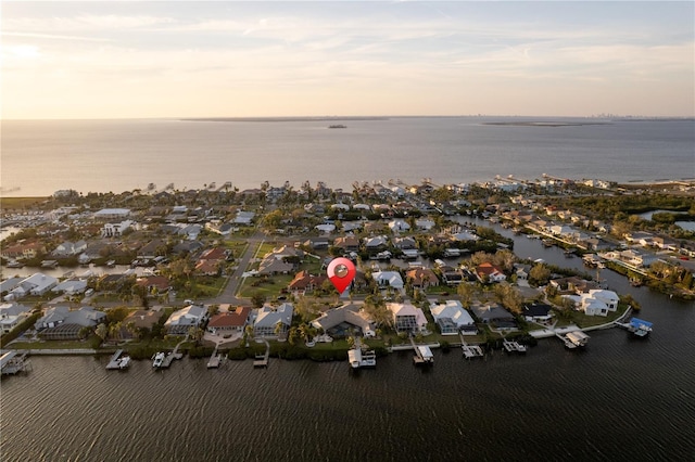 aerial view with a residential view and a water view