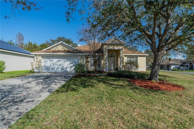 single story home featuring a garage, concrete driveway, and a front lawn