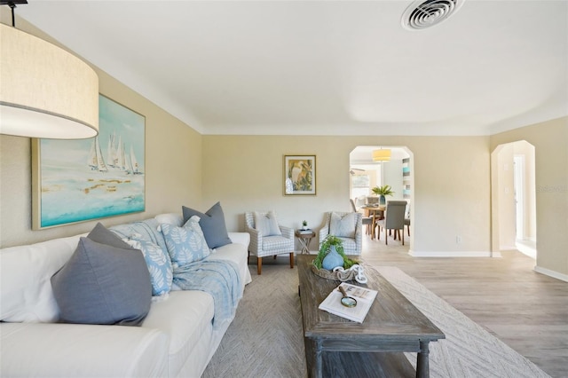 living room with wood-type flooring