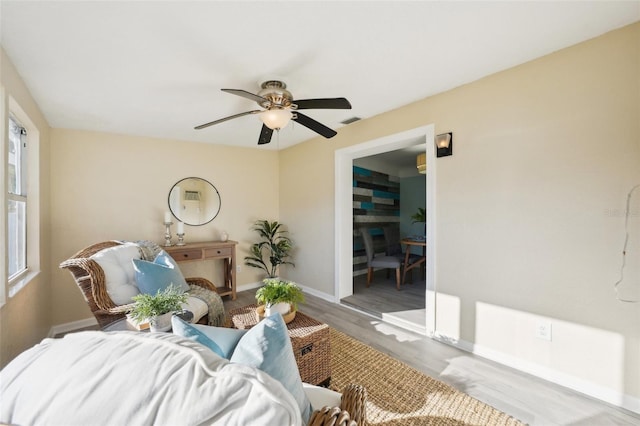 interior space with light hardwood / wood-style flooring and ceiling fan