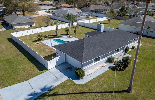 drone / aerial view with a residential view