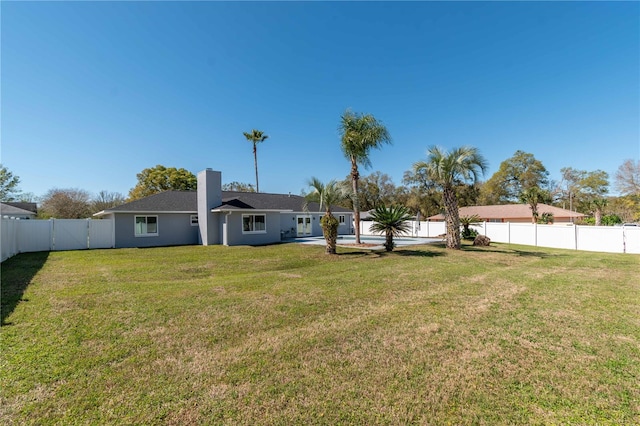 view of yard featuring a fenced backyard