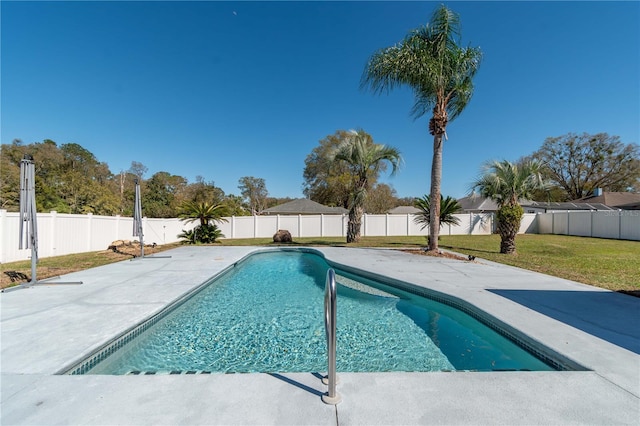 view of swimming pool with a yard, a patio, a fenced backyard, and a fenced in pool