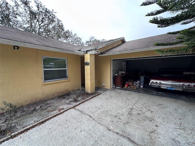 exterior space with a garage