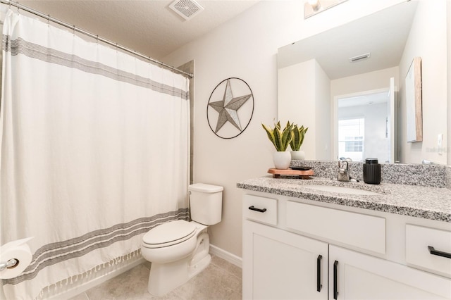 full bathroom with visible vents, vanity, toilet, and tile patterned floors