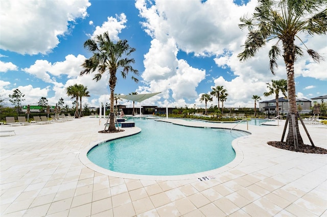 community pool featuring a patio