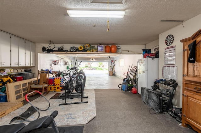 garage with freestanding refrigerator