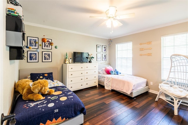 bedroom with dark wood-style floors, baseboards, ornamental molding, and ceiling fan