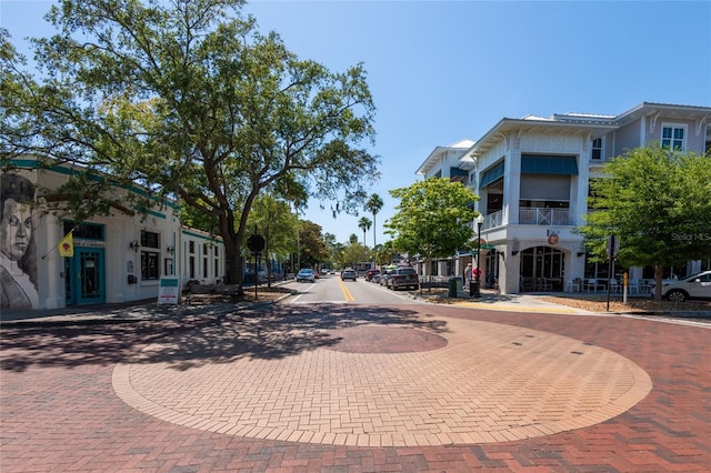 view of street featuring curbs and sidewalks