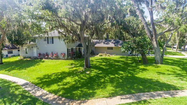 view of front of home featuring a front lawn