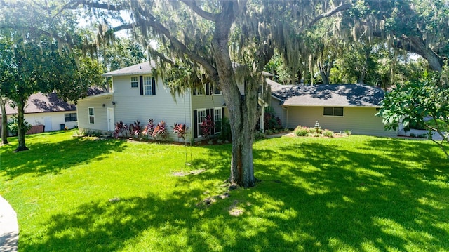 view of front of property with a front lawn