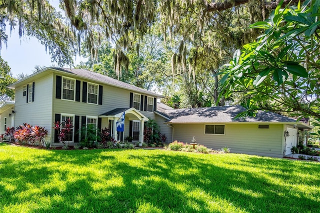 view of front of property with a front lawn