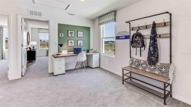 office area with light colored carpet