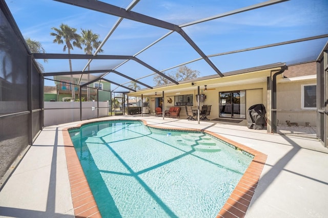 view of pool with a lanai, a patio area, and a fenced in pool