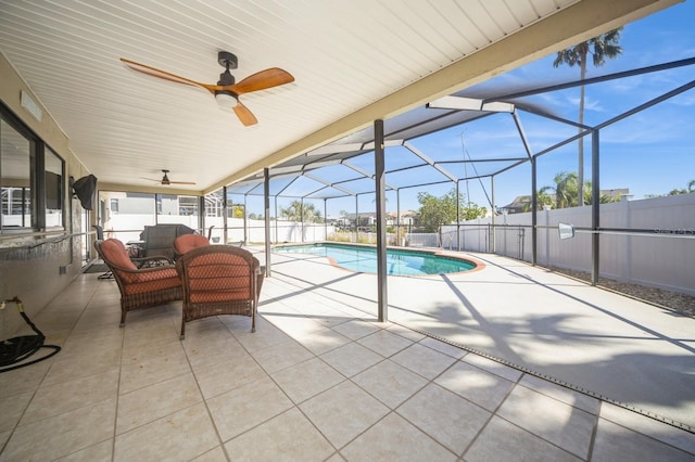 view of pool with a fenced in pool, a fenced backyard, an outdoor hangout area, a lanai, and a patio area