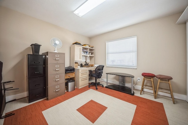 home office featuring baseboards