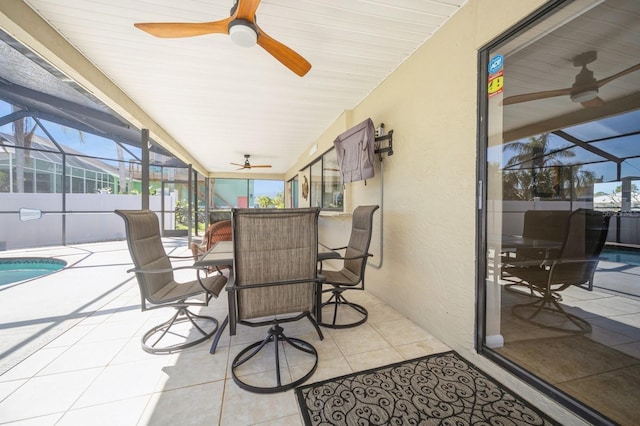 view of patio / terrace featuring a fenced in pool, a lanai, and ceiling fan