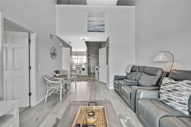 living room with light hardwood / wood-style floors