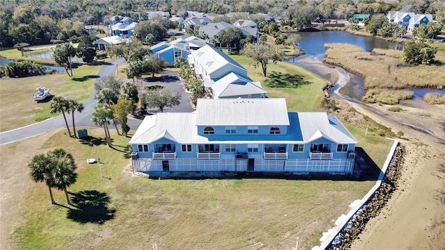 drone / aerial view featuring a water view