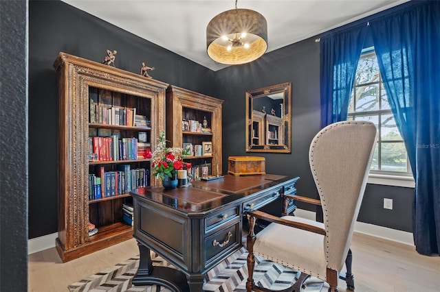 office with light wood finished floors and baseboards