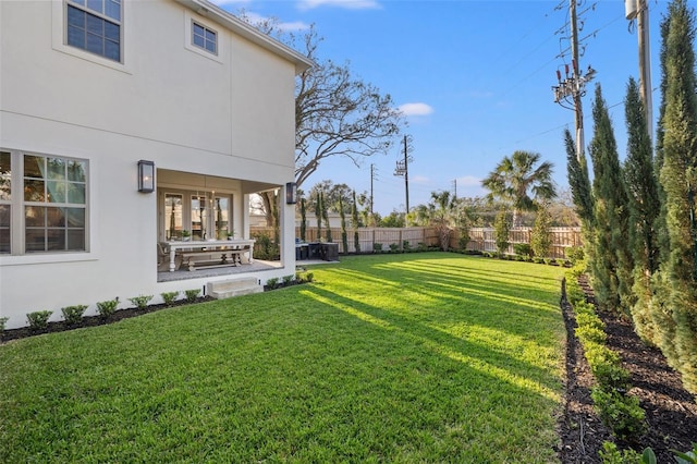 view of yard featuring a fenced backyard