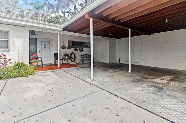 view of patio featuring an attached carport